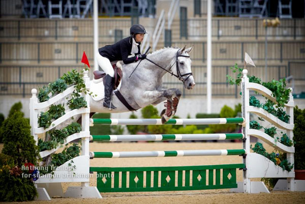 Dasha Ivandaeva aboard Autorytet In the CH-Y** show jumping finale.